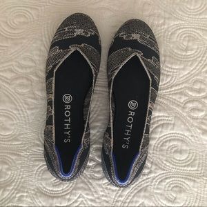 Rothy’s black and gold flats